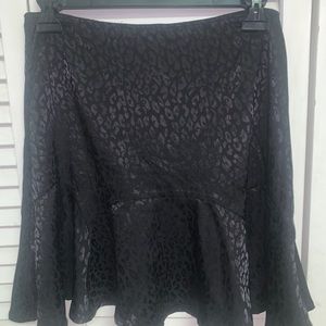 Brand new flowey, black cheetah print skirt
